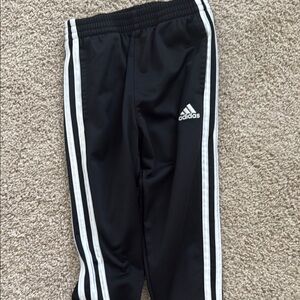 Adidas Black and White Sweatpants with Iconic Stripes